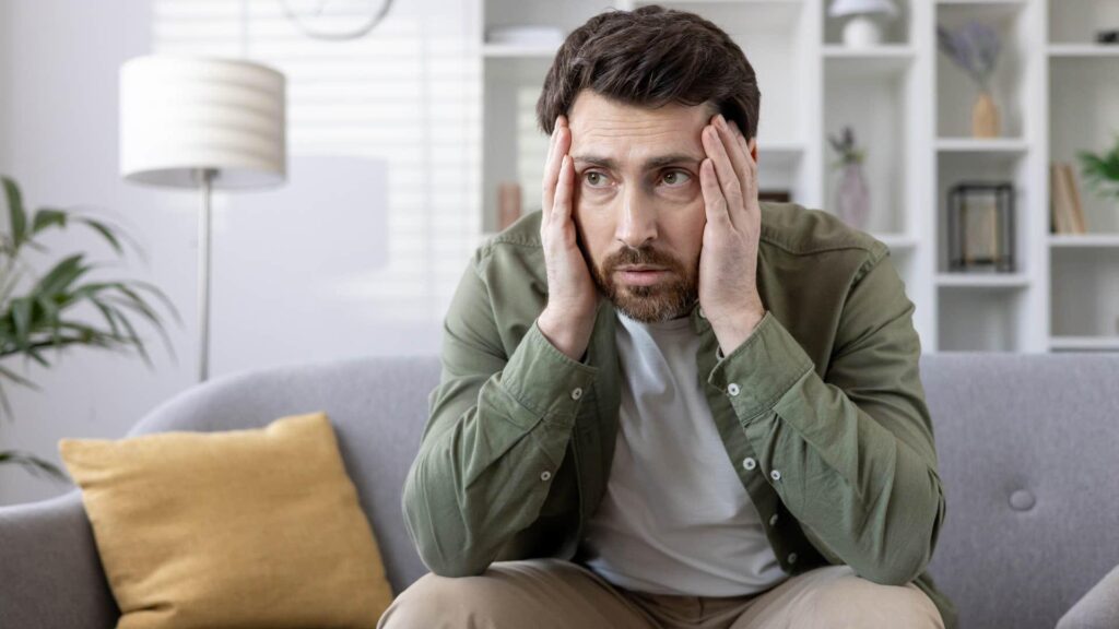 Calm man controlling anger and emotions during an argument